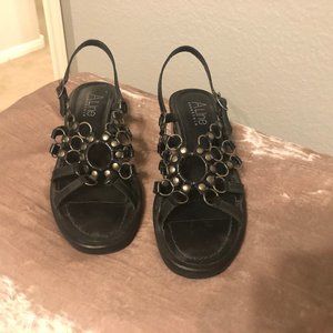 Black leather and metal sandals